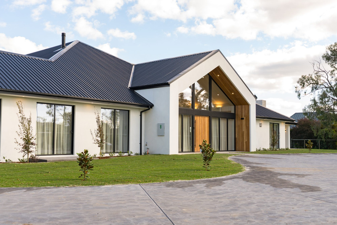 Angled view of the raked glass gable and awning windows on a new Mooroolbark home